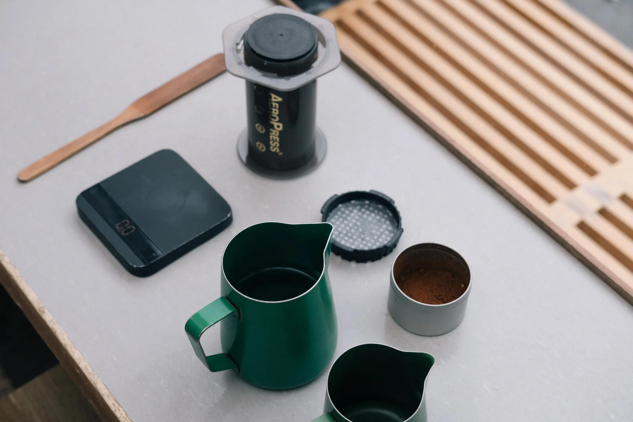 AeroPress coffee lifestyle image used on AeroPress's Shopify website